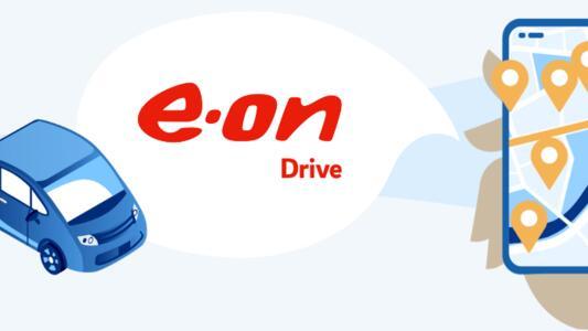 Imagine cu masina electrica si aplicatie deschisa oe telefon Eon Drive